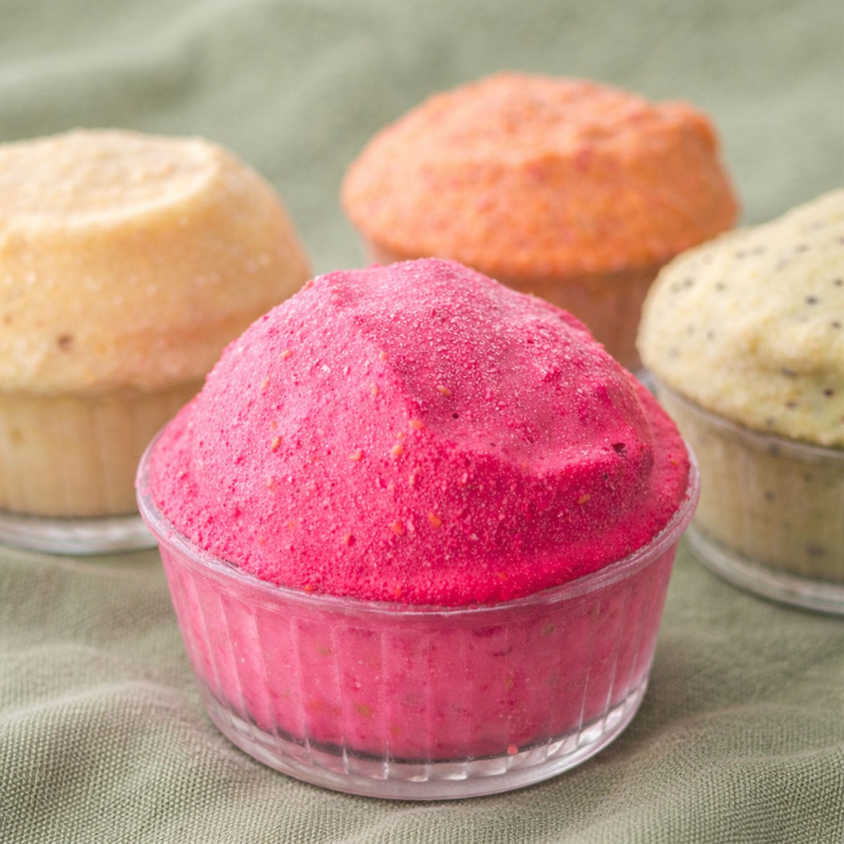 cottage cheese ice cream in raspberry, apricot, pineapple, and kiwi flavors served in glass ramekins