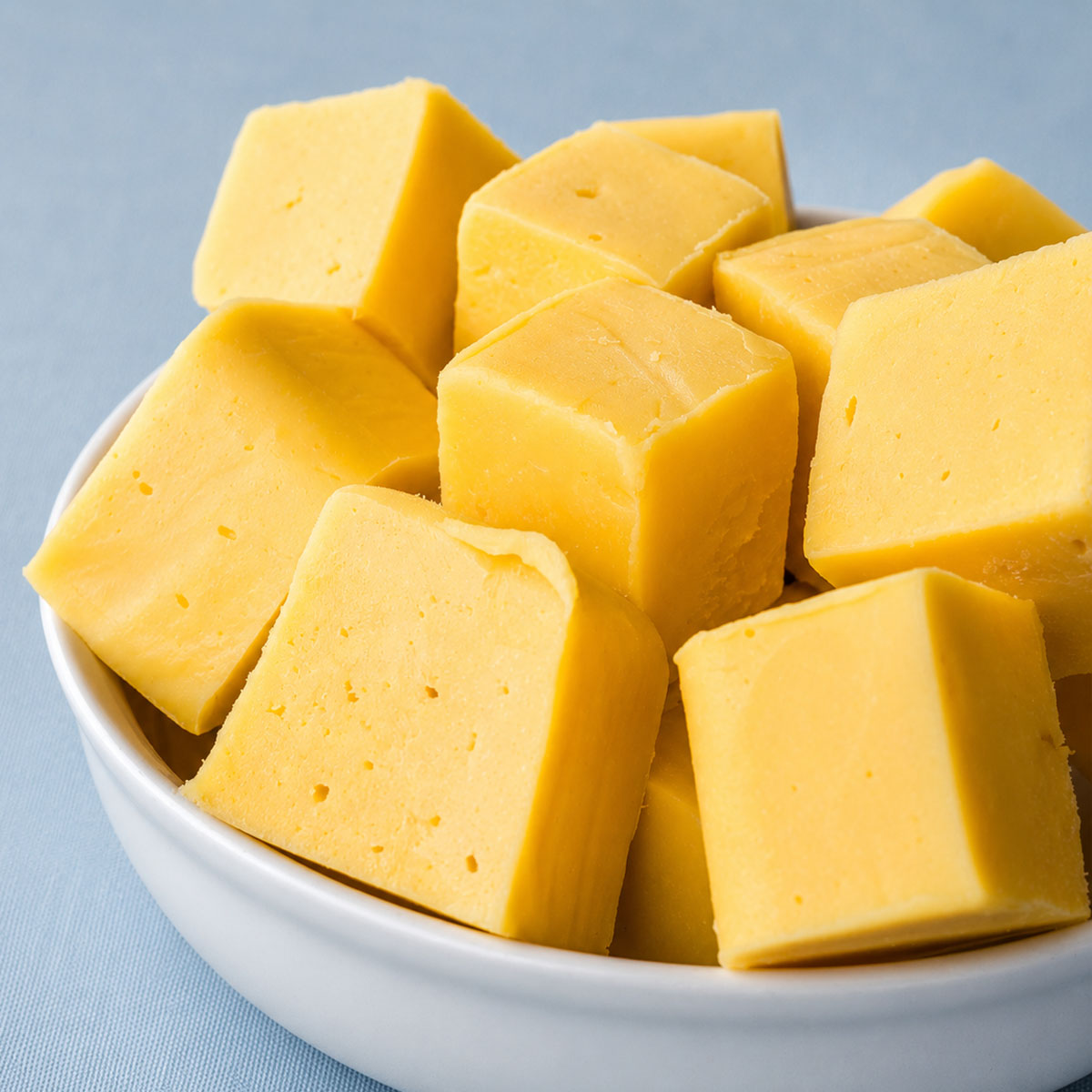 Bowl of easy lemon fudge made with sweetened condensed milk and white chocolate.