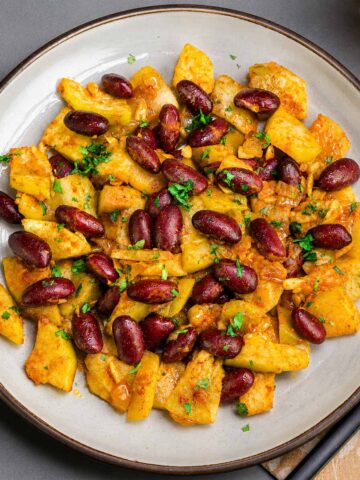 Sauteed summer squash with red kidney beans, onions, garlic, and fresh parsley