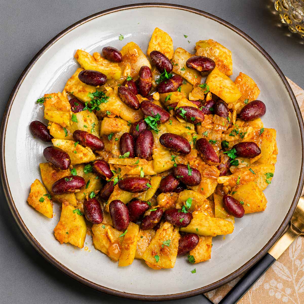 Sauteed summer squash with red kidney beans, onions, garlic, and fresh parsley