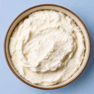 Creamy Toum (Lebanese Garlic Sauce) in a rustic bowl with smooth whipped texture