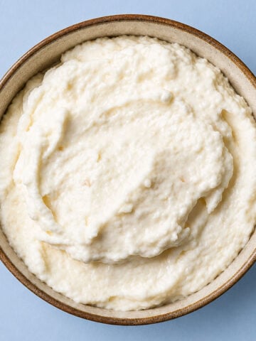 Creamy Toum (Lebanese Garlic Sauce) in a rustic bowl with smooth whipped texture