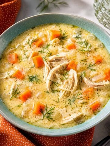 Greek lemon chicken soup with orzo (avgolemono soup) is creamy, bright, and comforting, made with tender chicken, egg yolks, lemon juice, dill, and a rich broth.