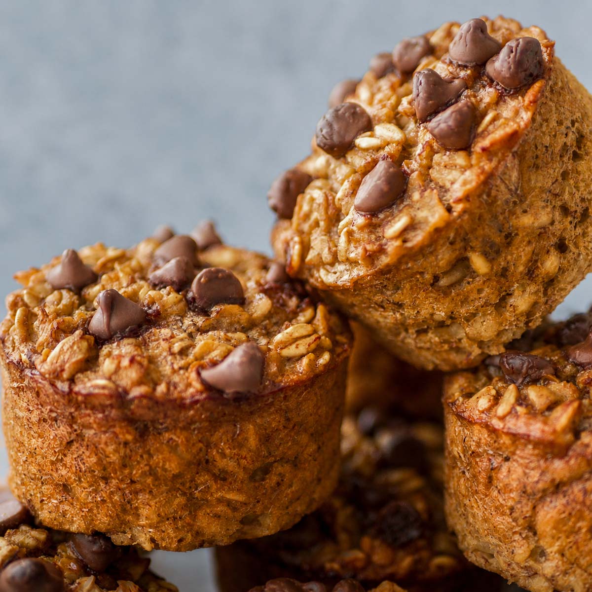 Close-up of flourless banana oatmeal chocolate chip muffins with rolled oats and chocolate chips
