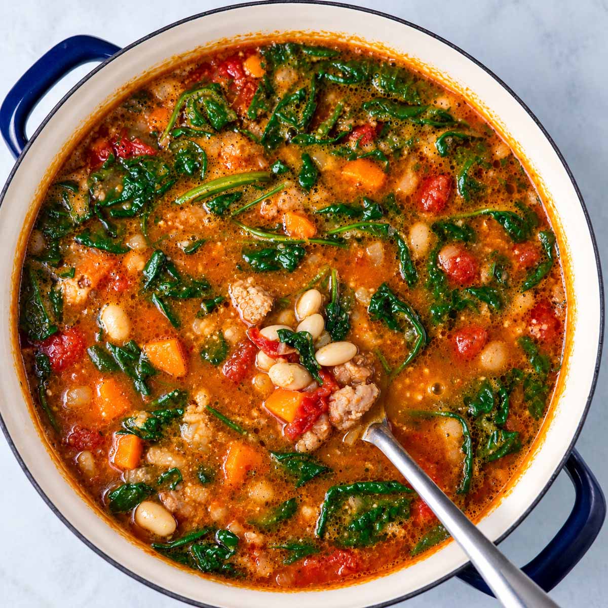 Italian sausage white bean soup with spinach and carrots