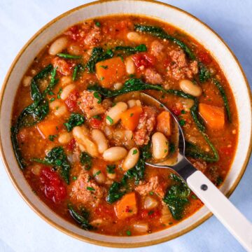 Italian sausage and white bean soup in a bowl