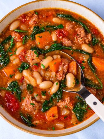 Italian sausage and white bean soup in a bowl